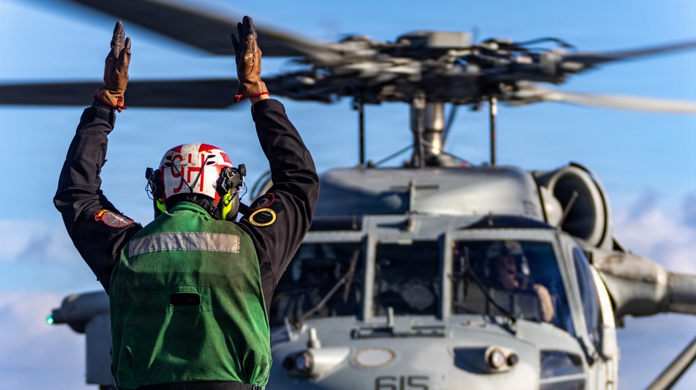 MH-60S Sea Hawk helicopter operations on USS Gerald R. Ford during Operation Epic Fury