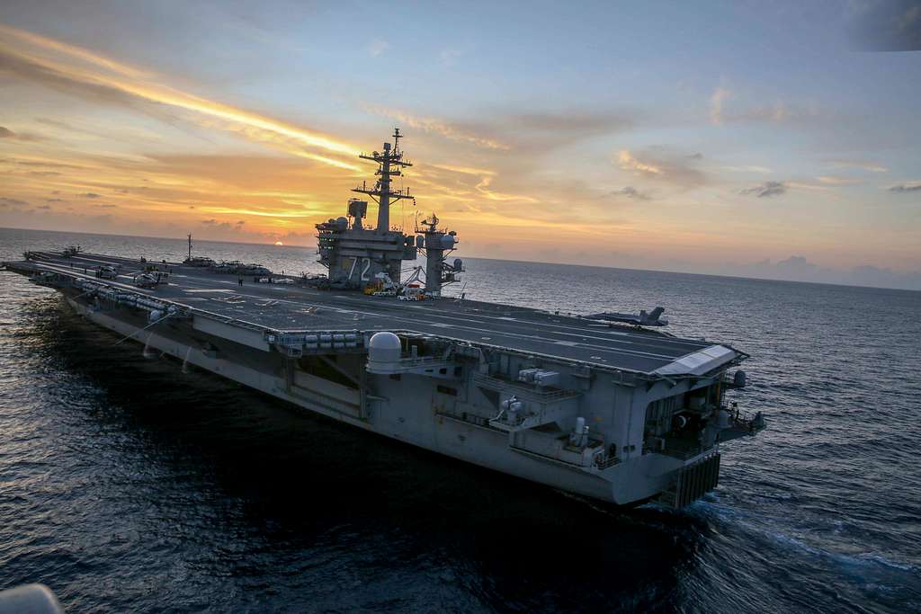 U.S. Carrier Strike Group Positioning in Middle East as Iran Claims Drone Surveillance and Issues Hypersonic Threats