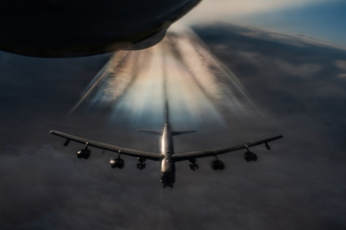 A KC-135 Stratotanker refuels a B-52H Stratofortress of the 96th Bomb Squadron over the Persian Gulf during Operation Epic Fury, March 20, 2026.